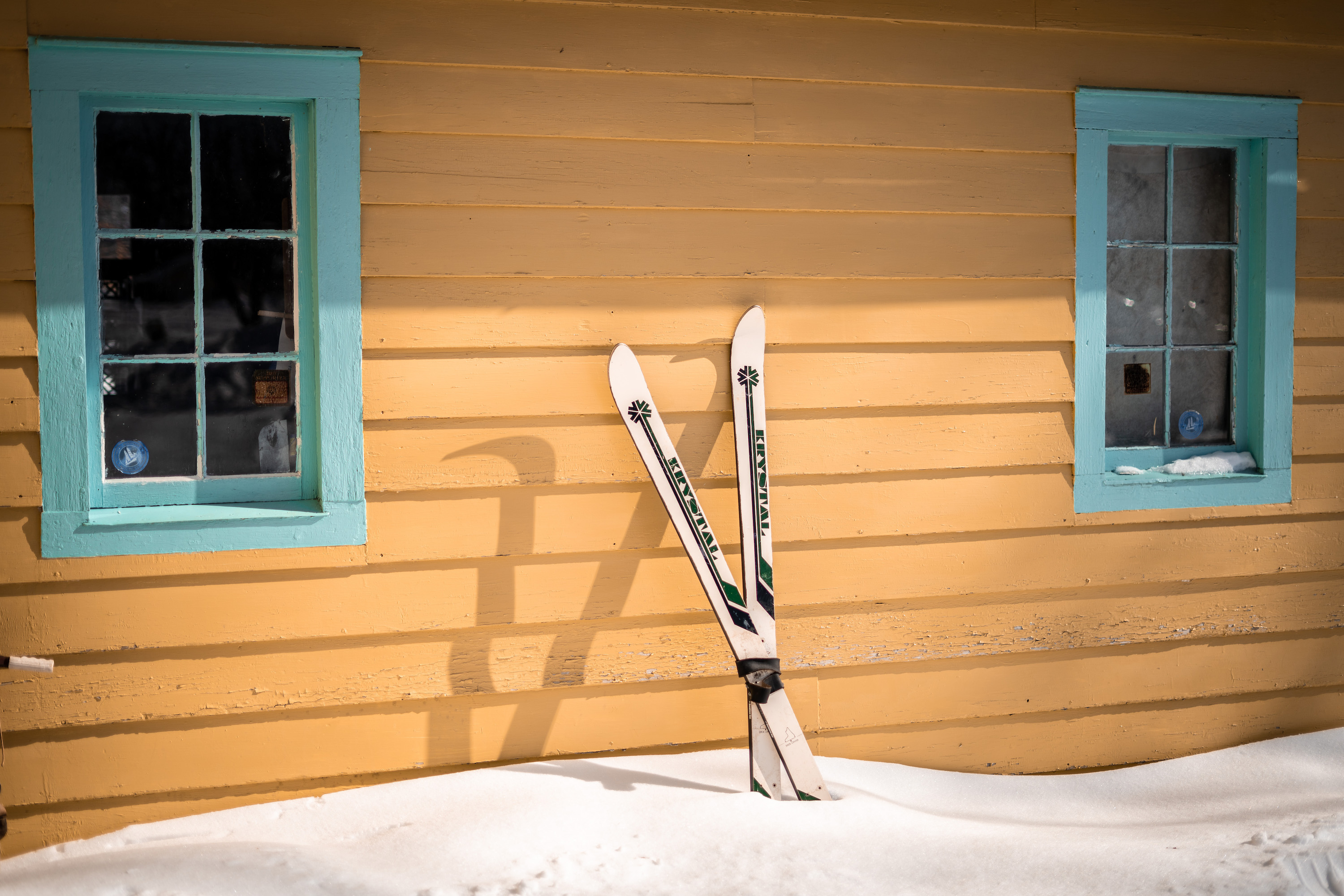 A pair of skis propped up against Doc's Harbor Inn in Warroad
