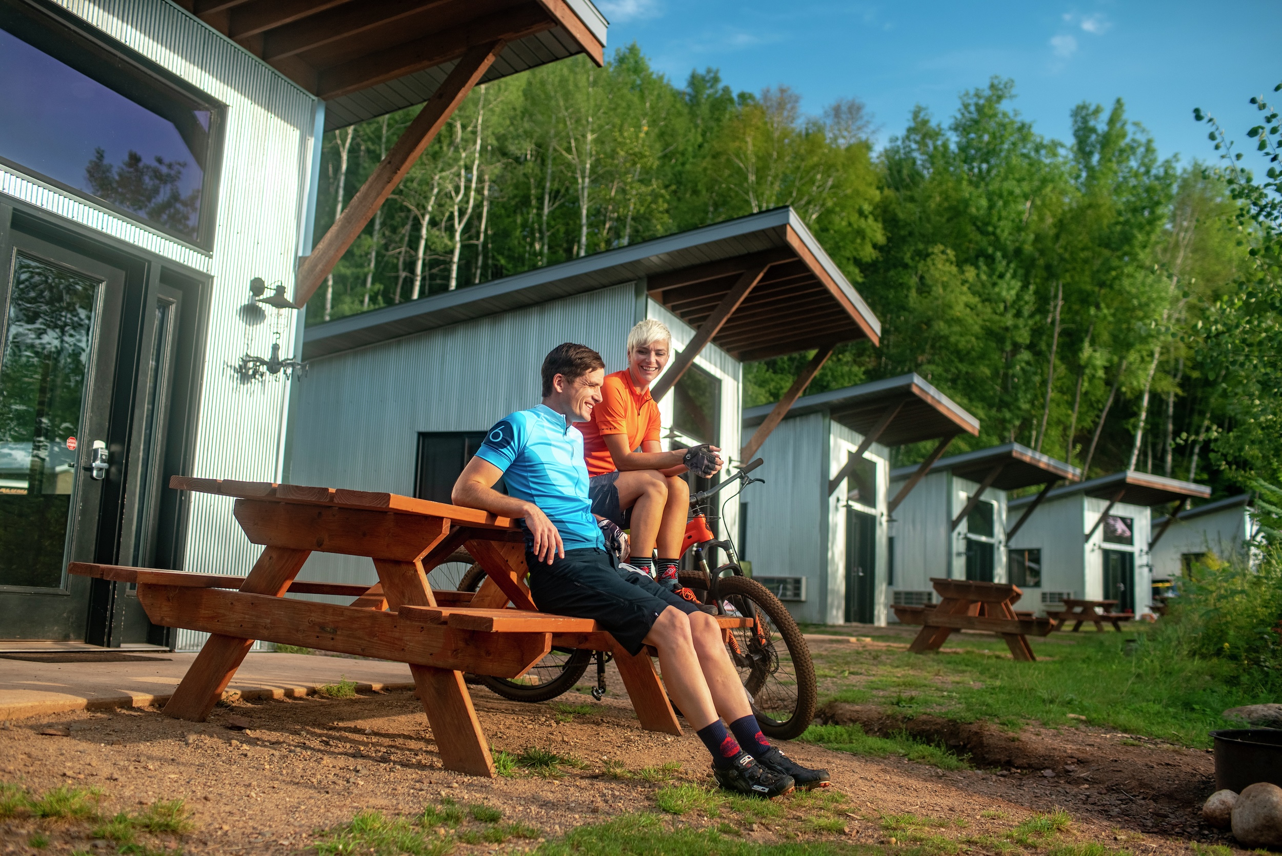 Ironton Cuyuna bike True North Basecamp cabins couple
