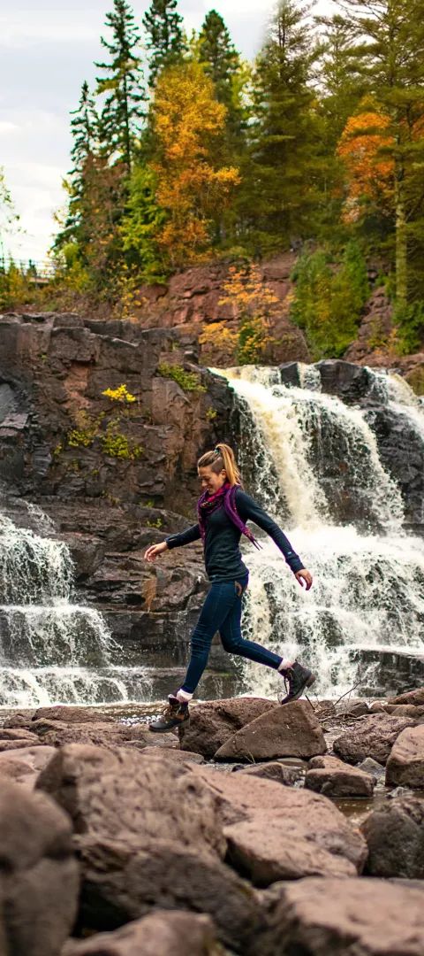 Woman hiking at Gooseberry Falls State Park