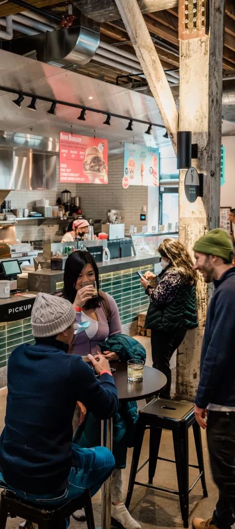 Customers eat at Malcolm Yards' food hall