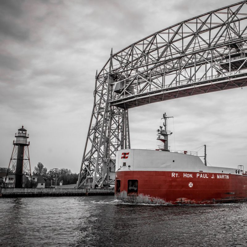 Ship passes beneath the Aerial Lift Bridge in Duluth