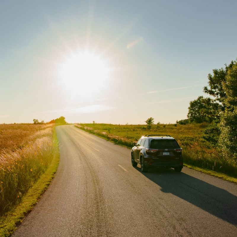 Luverne car driving through prairie