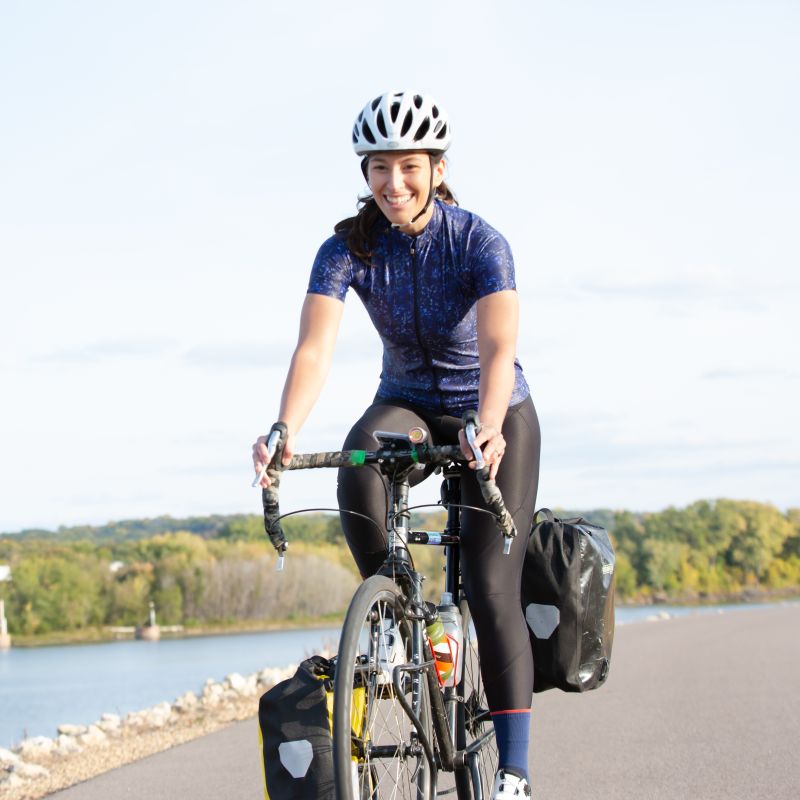 Woman bike touring the Mississippi River Trail