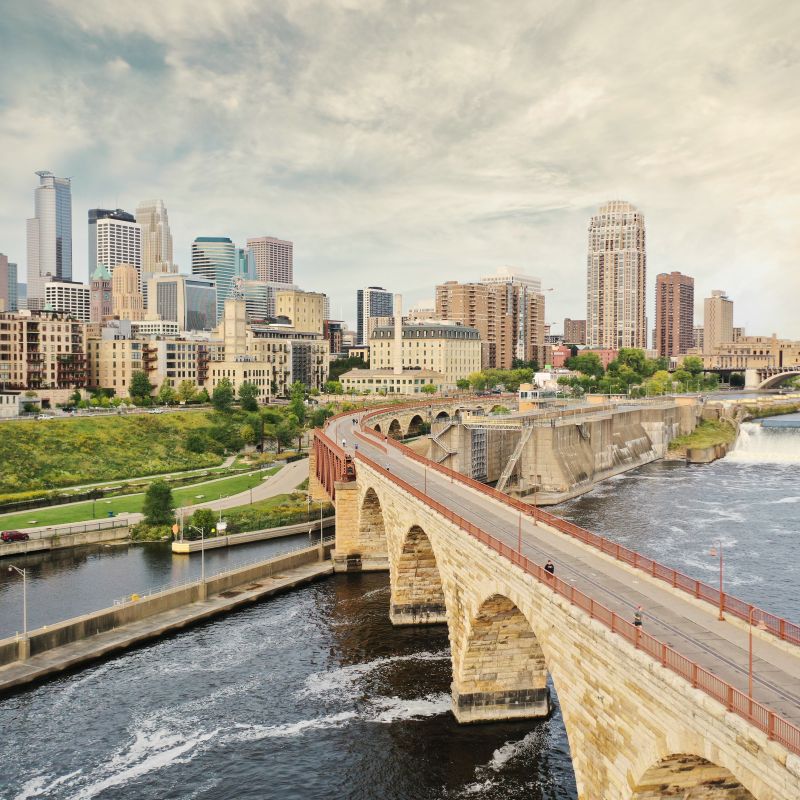 Aerial shot of Downtown Minneapolis Skyline and Stone Arch Bridge
