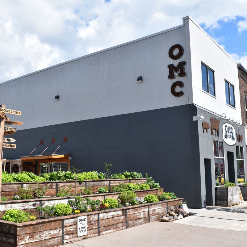 Exterior of OMC Smokehouse and stepped flower planters