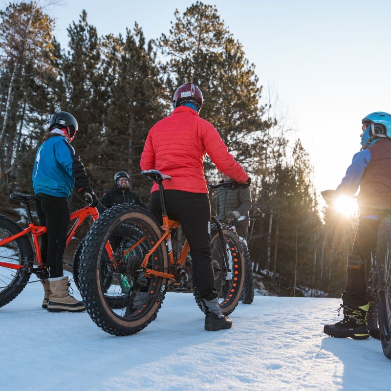 A family on fat bikes at Hidden Valley Recreation Area in Ely